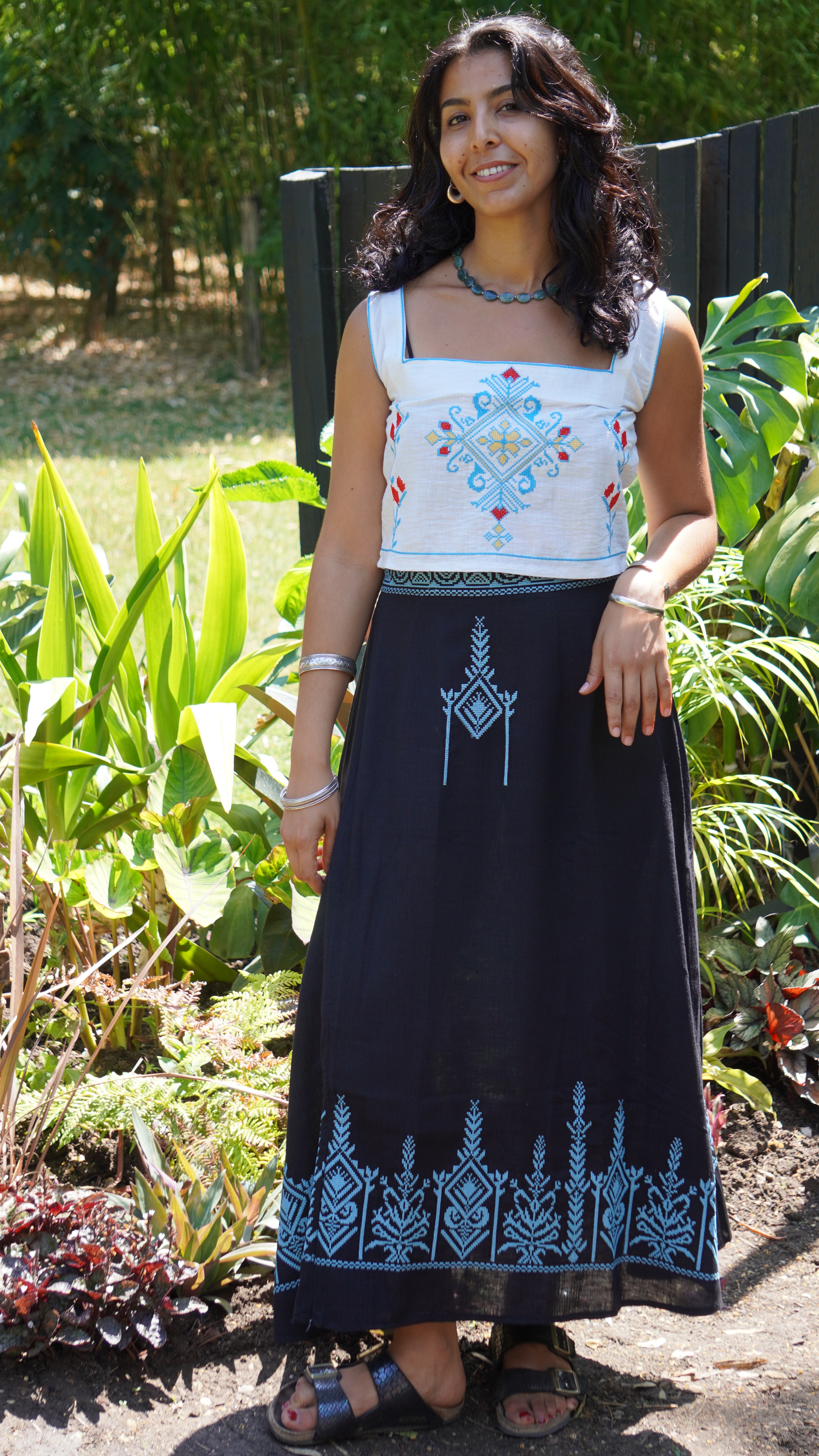 Long black skirt with turquoise embroidery